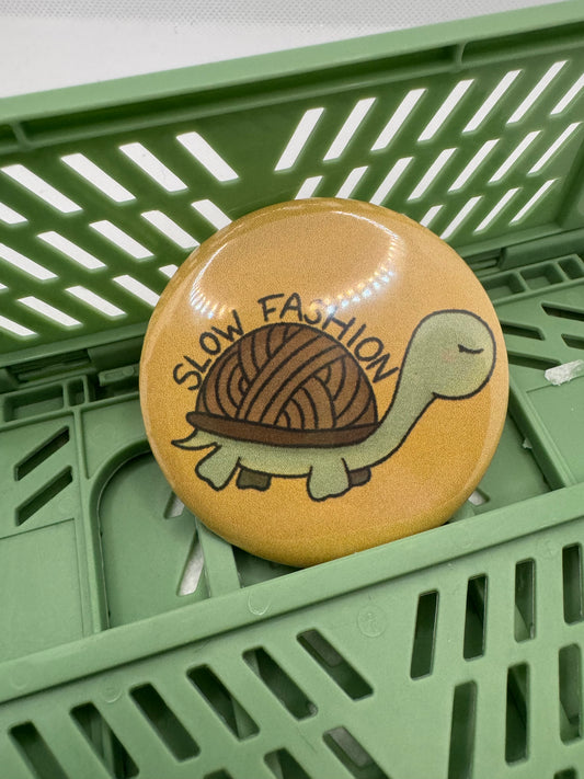 Slow fashion button badge