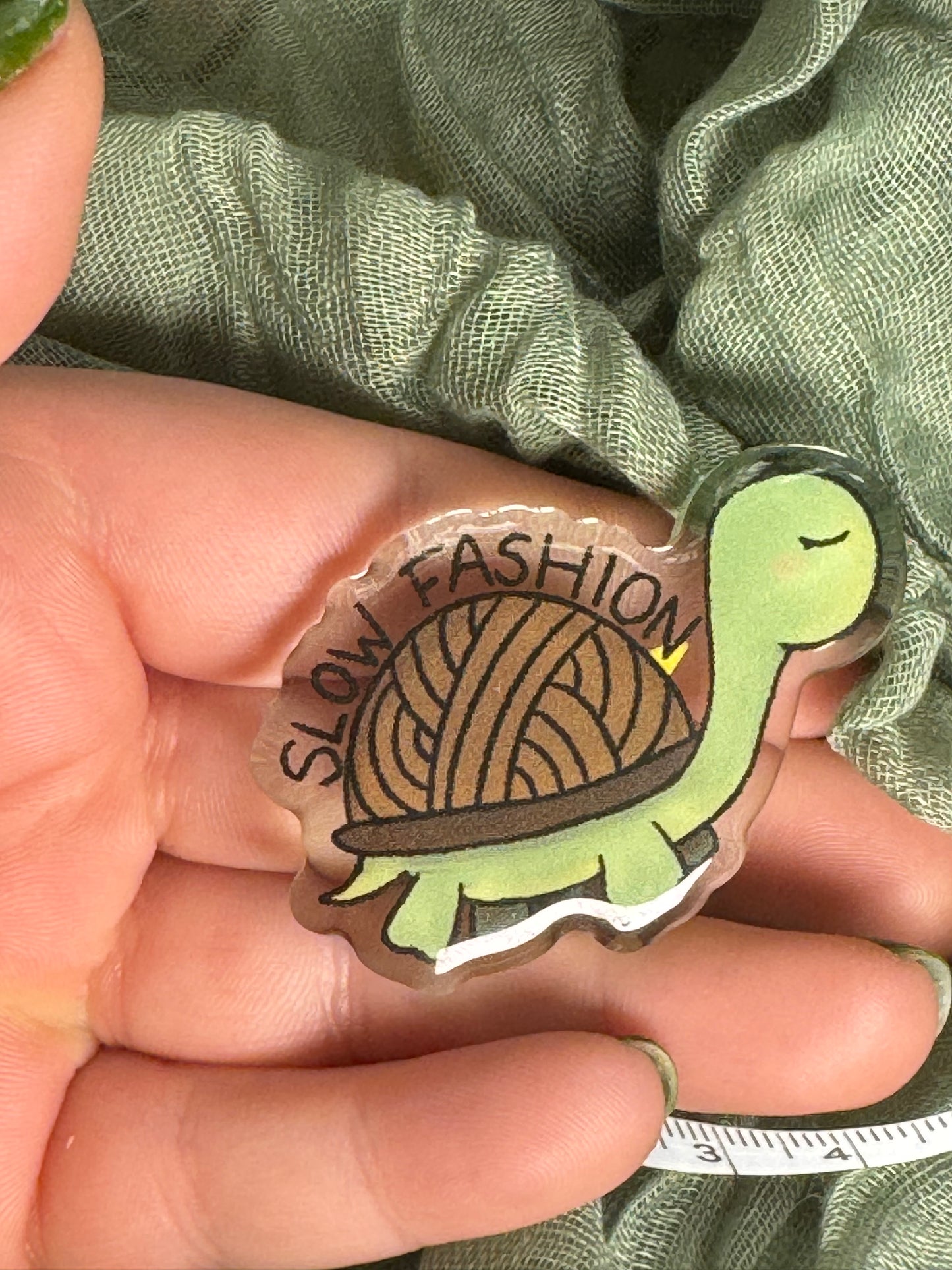Slow fashion acrylic pin