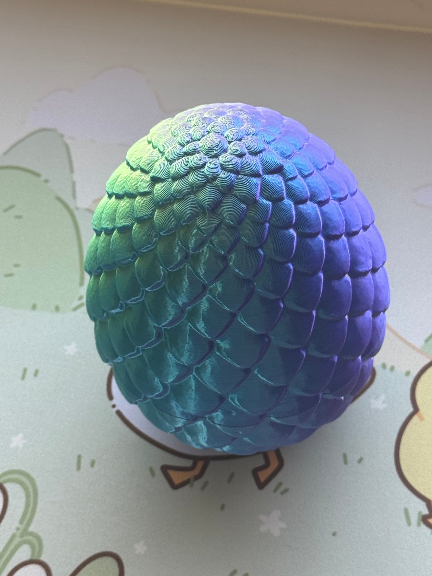 Baby dragon in an egg