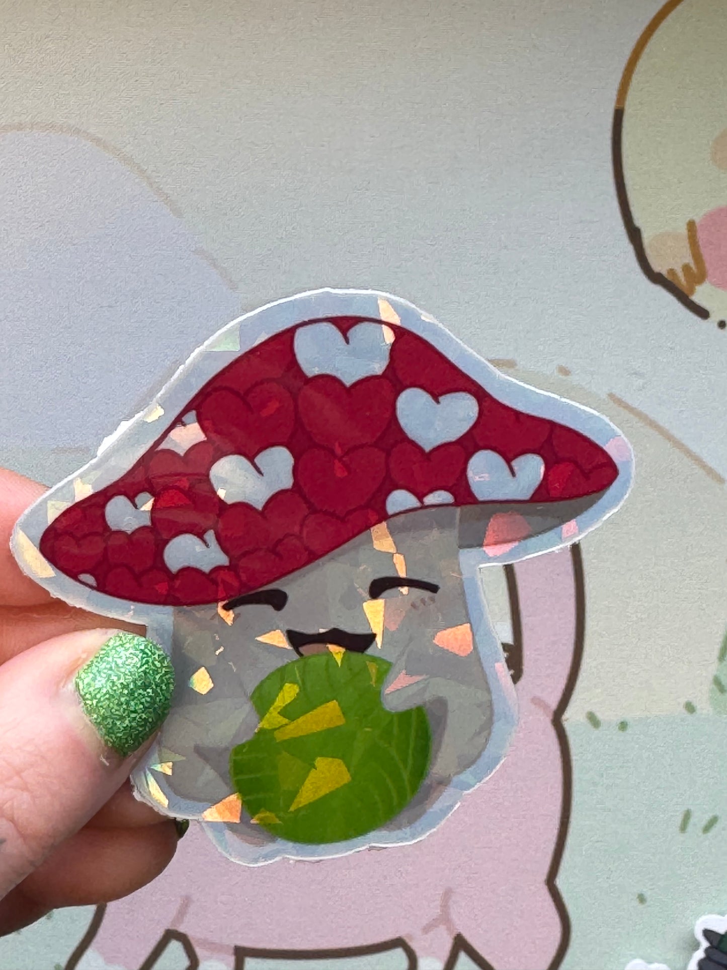 Mushroom holding yarn sticker