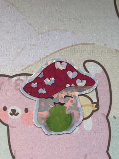 Mushroom holding yarn sticker
