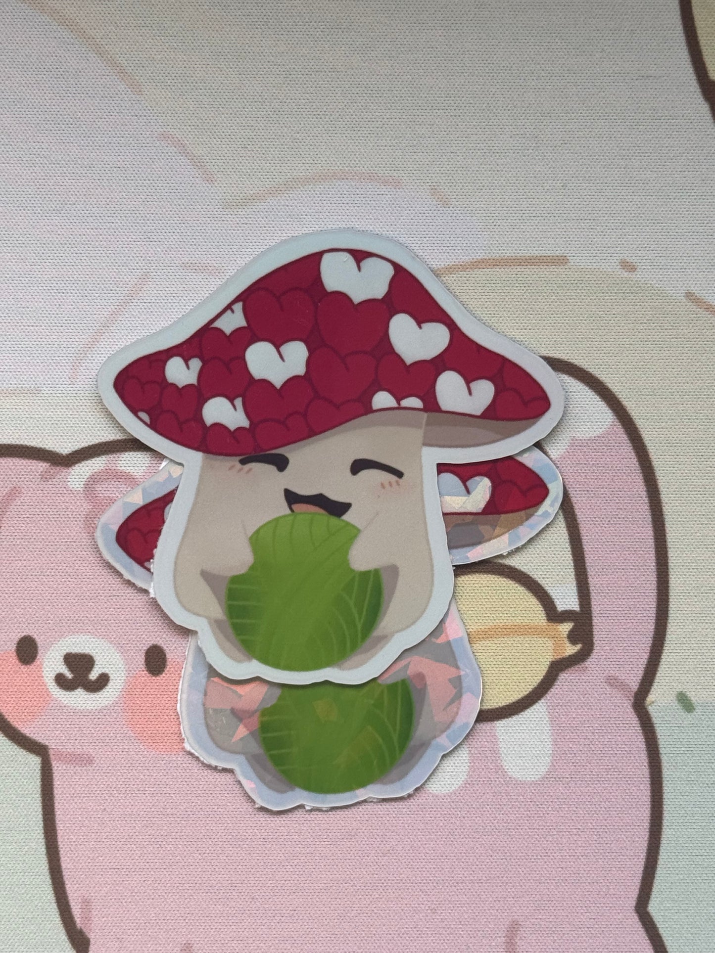 Mushroom holding yarn sticker