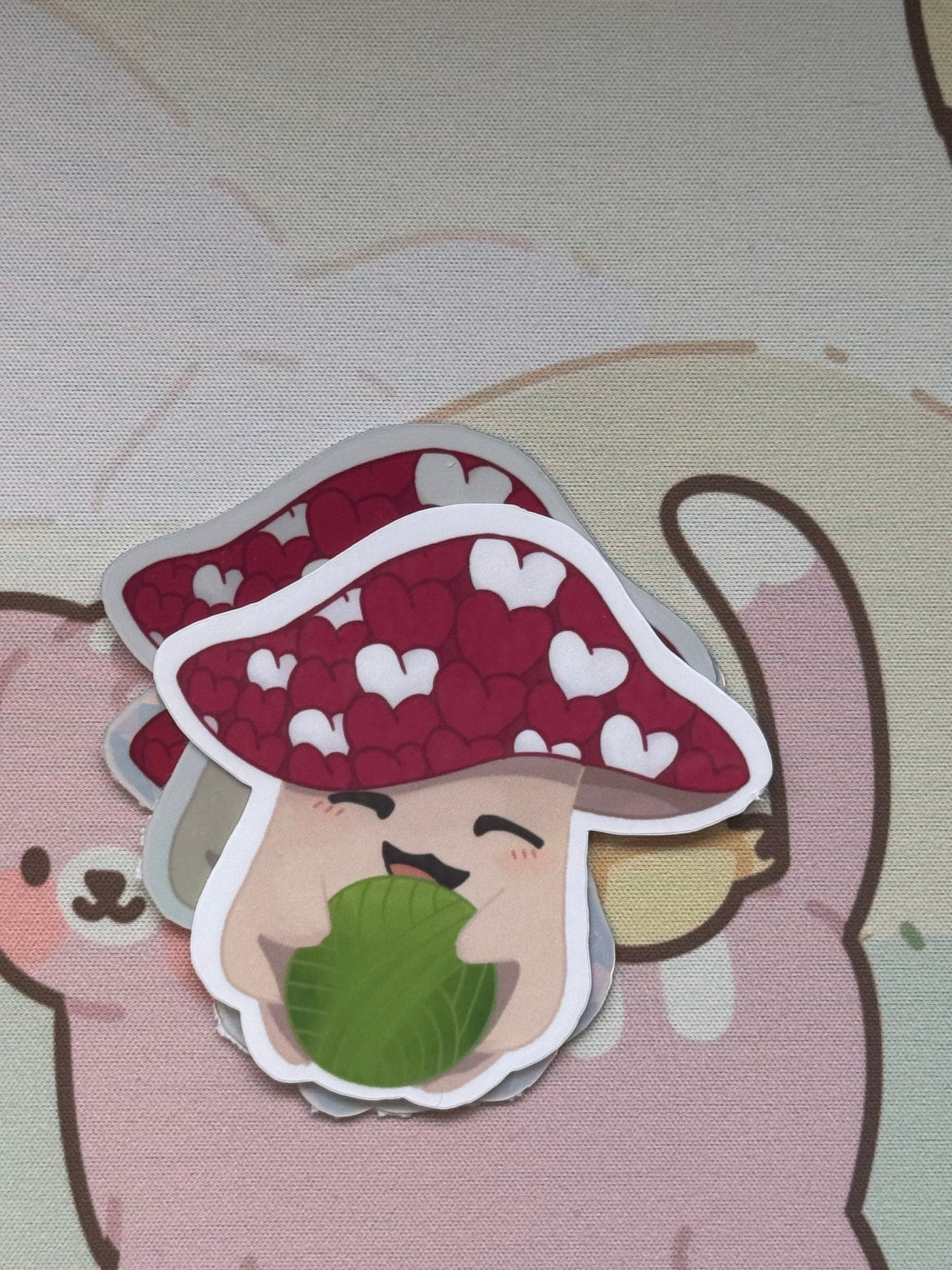 Mushroom holding yarn sticker