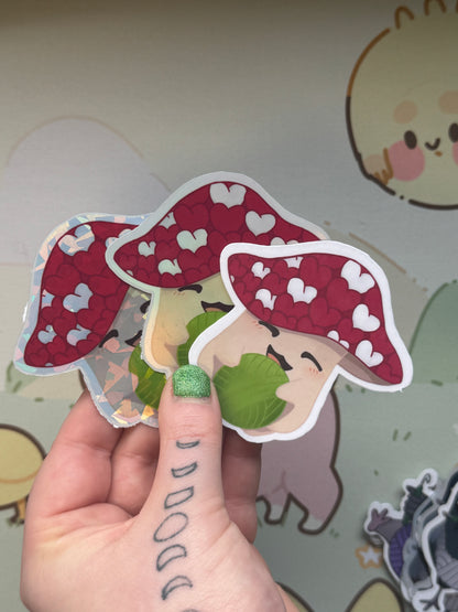 Mushroom holding yarn sticker