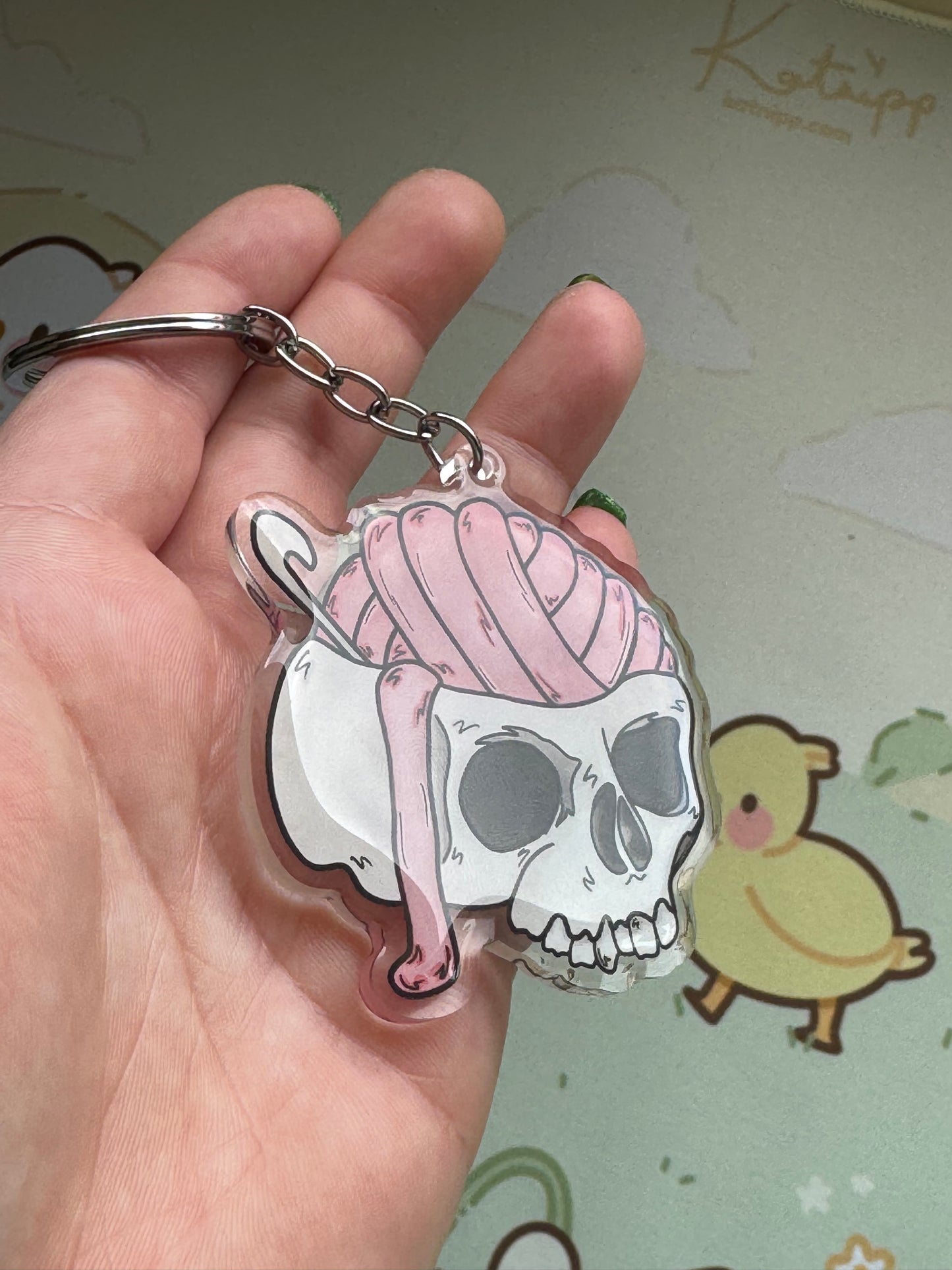 Skull with yarn brains keyring