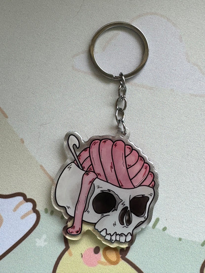 Skull with yarn brains keyring